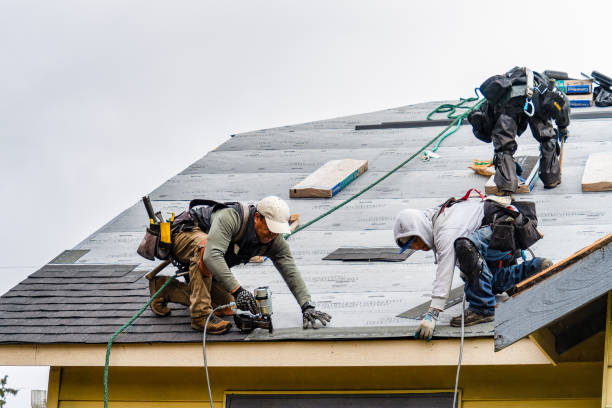 Professional Roofing technician working in Cogan Station, PA